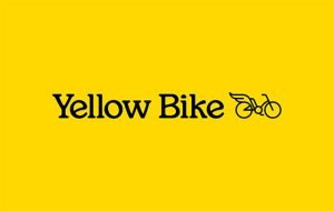 Logotipo negro de Yellow Bike sobre fondo amarillo